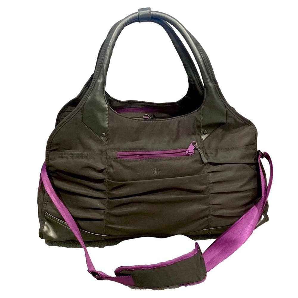 Athleta gray and purple sports bag with removable padded shoulder strap.